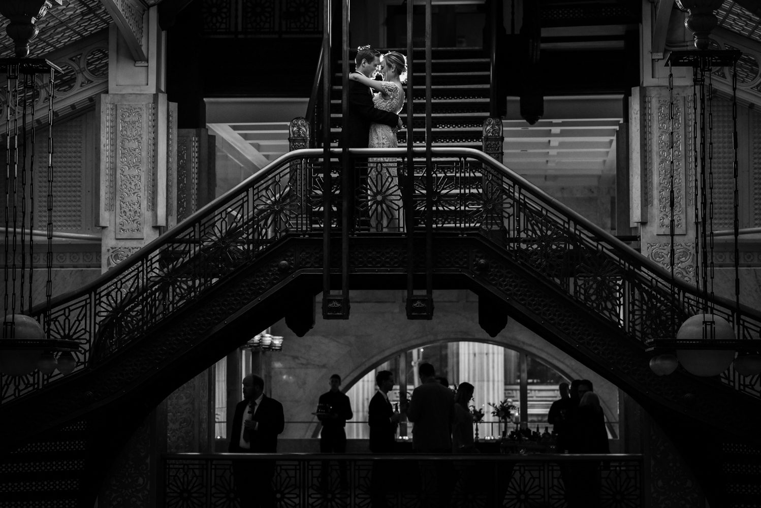 Bride and Groom on The Rookery staircase Chicago by Candice Cusic