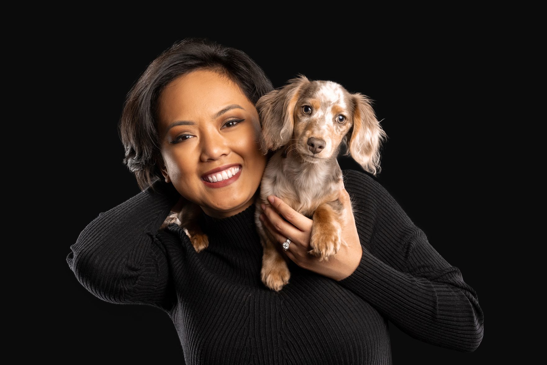 Woman in black sweater with dark hair and her dog, family portrait by cusic photo, chicago pet and family photographer