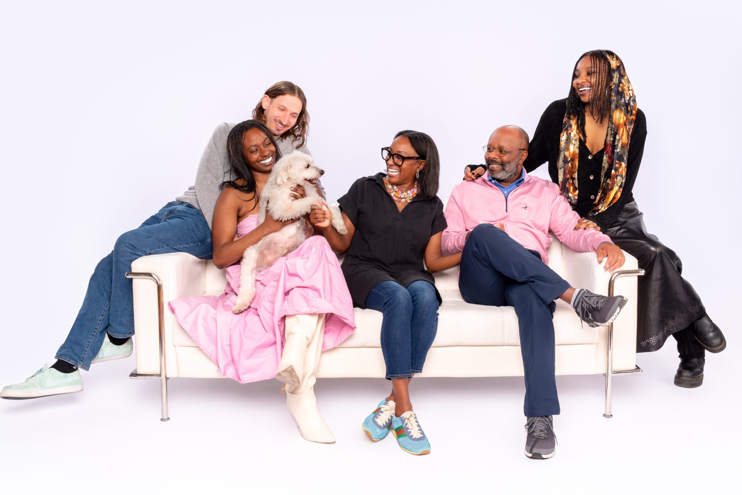 Family photograph with the family dog inside a chicago portrait studio by candice cusic