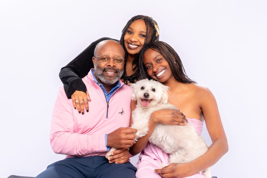 Family photograph with a white dog by candice cusic